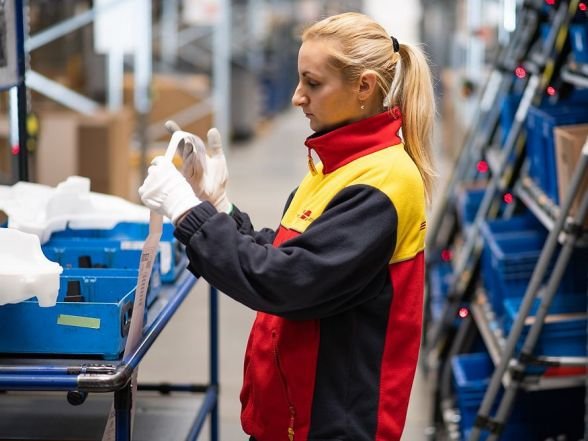 Employee working in cold chain warehouse