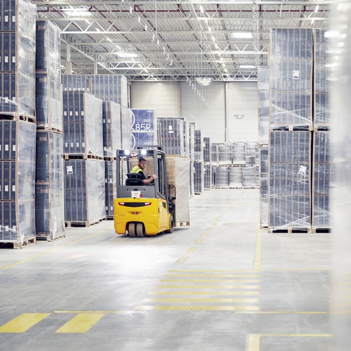 CGN forklift driver in warehouse operations